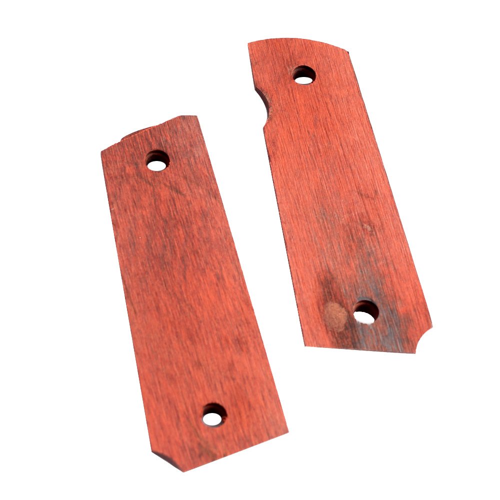Inside face of the grip panels with screw holes Inside face of the grip panels with screw holes